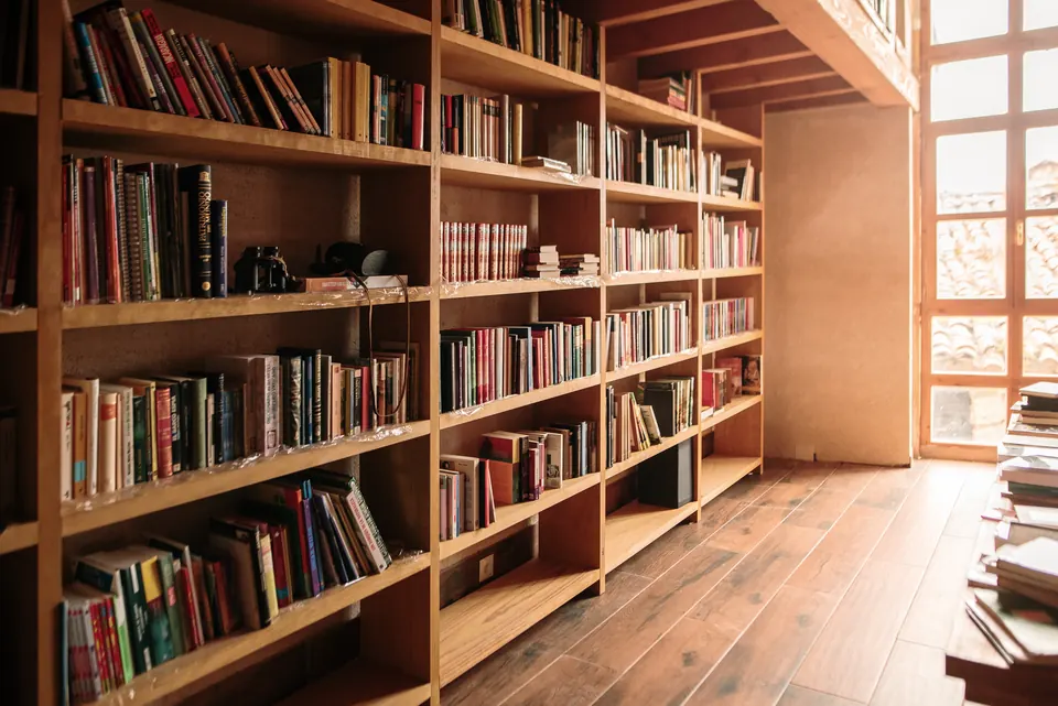 Floor-to-ceiling wooden bookshelves